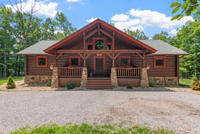 Elegant log home with natural materials, mountain setting, and custom craftsmanship showcasing timel.