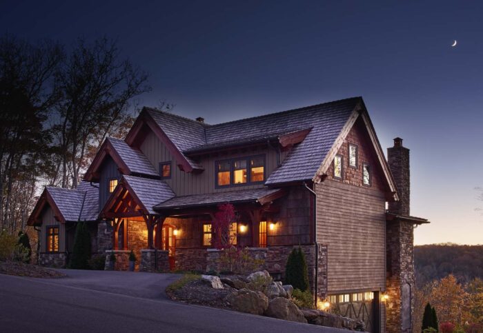Elegant mountain log home with natural materials, blending rustic charm and modern craftsmanship for.