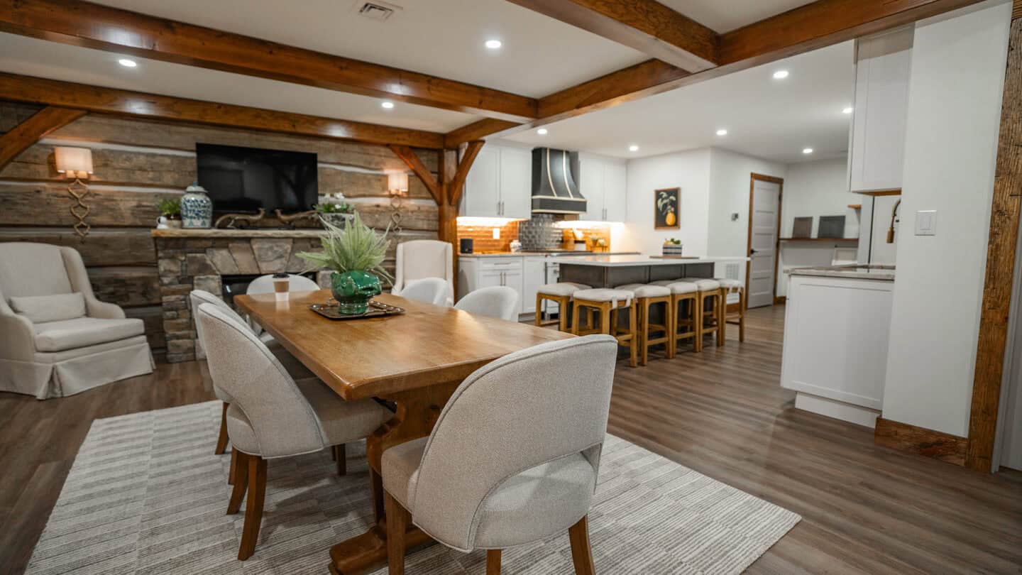 A lush, natural log cabin interior with modern amenities, blending rustic charm with contemporary de.